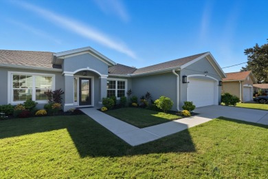 Immaculate Seagate-built Willow model located in the desirable on The Grand Club - Pine Lakes Course in Florida - for sale on GolfHomes.com, golf home, golf lot