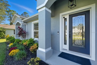 Immaculate Seagate-built Willow model located in the desirable on The Grand Club - Pine Lakes Course in Florida - for sale on GolfHomes.com, golf home, golf lot