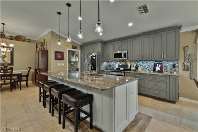 EXTENSIVE UPGRADES WITH THIS CYPRESS MODEL POOL HOME WITH A on Colonial Country Club in Florida - for sale on GolfHomes.com, golf home, golf lot