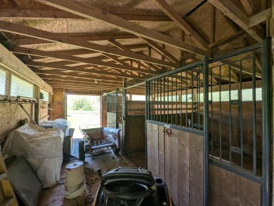 Beautiful acreage set up for horses! This lovely 3 bed, 1.5 bath on Grand Rapids Sparta Moose Golf Course in Michigan - for sale on GolfHomes.com, golf home, golf lot