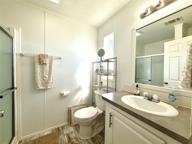 Located in the sought-after Caribbean Isles, this beautifully on Apollo Beach Golf and Sea Club in Florida - for sale on GolfHomes.com, golf home, golf lot