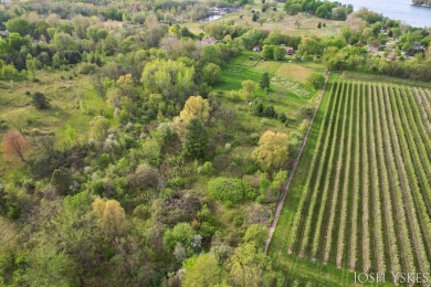 Beautiful acreage set up for horses! This lovely 3 bed, 1.5 bath on Grand Rapids Sparta Moose Golf Course in Michigan - for sale on GolfHomes.com, golf home, golf lot