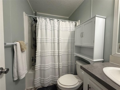 Located in the sought-after Caribbean Isles, this beautifully on Apollo Beach Golf and Sea Club in Florida - for sale on GolfHomes.com, golf home, golf lot