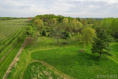 Beautiful acreage set up for horses! This lovely 3 bed, 1.5 bath on Grand Rapids Sparta Moose Golf Course in Michigan - for sale on GolfHomes.com, golf home, golf lot