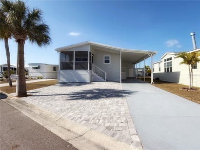 Located in the sought-after Caribbean Isles, this beautifully on Apollo Beach Golf and Sea Club in Florida - for sale on GolfHomes.com, golf home, golf lot