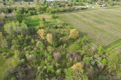 Beautiful acreage set up for horses! This lovely 3 bed, 1.5 bath on Grand Rapids Sparta Moose Golf Course in Michigan - for sale on GolfHomes.com, golf home, golf lot