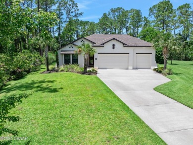 This custom home built 2018 sits on over  3/4  of an acre, in on Plantation Bay Golf and Country Club in Florida - for sale on GolfHomes.com, golf home, golf lot