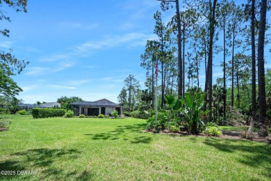 This custom home built 2018 sits on over  3/4  of an acre, in on Plantation Bay Golf and Country Club in Florida - for sale on GolfHomes.com, golf home, golf lot