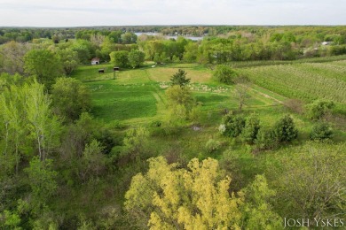 Beautiful acreage set up for horses! This lovely 3 bed, 1.5 bath on Grand Rapids Sparta Moose Golf Course in Michigan - for sale on GolfHomes.com, golf home, golf lot