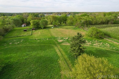 Beautiful acreage set up for horses! This lovely 3 bed, 1.5 bath on Grand Rapids Sparta Moose Golf Course in Michigan - for sale on GolfHomes.com, golf home, golf lot