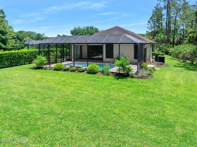 This custom home built 2018 sits on over  3/4  of an acre, in on Plantation Bay Golf and Country Club in Florida - for sale on GolfHomes.com, golf home, golf lot
