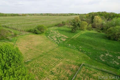 Beautiful acreage set up for horses! This lovely 3 bed, 1.5 bath on Grand Rapids Sparta Moose Golf Course in Michigan - for sale on GolfHomes.com, golf home, golf lot