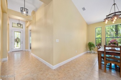 This custom home built 2018 sits on over  3/4  of an acre, in on Plantation Bay Golf and Country Club in Florida - for sale on GolfHomes.com, golf home, golf lot