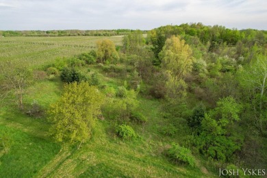 Beautiful acreage set up for horses! This lovely 3 bed, 1.5 bath on Grand Rapids Sparta Moose Golf Course in Michigan - for sale on GolfHomes.com, golf home, golf lot