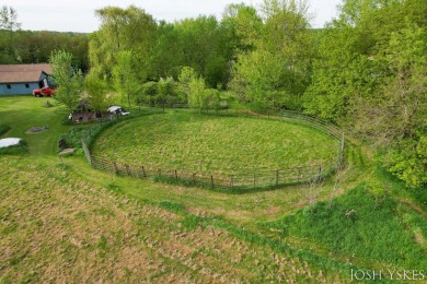 Beautiful acreage set up for horses! This lovely 3 bed, 1.5 bath on Grand Rapids Sparta Moose Golf Course in Michigan - for sale on GolfHomes.com, golf home, golf lot