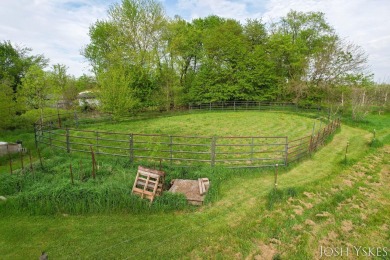 Beautiful acreage set up for horses! This lovely 3 bed, 1.5 bath on Grand Rapids Sparta Moose Golf Course in Michigan - for sale on GolfHomes.com, golf home, golf lot
