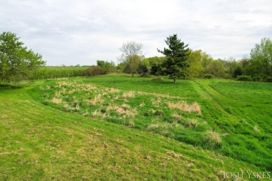 Beautiful acreage set up for horses! This lovely 3 bed, 1.5 bath on Grand Rapids Sparta Moose Golf Course in Michigan - for sale on GolfHomes.com, golf home, golf lot