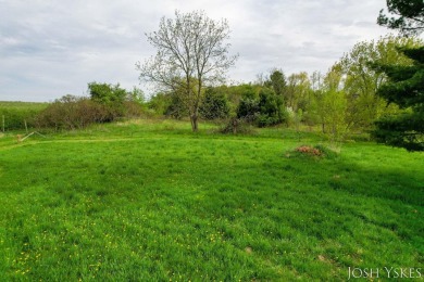 Beautiful acreage set up for horses! This lovely 3 bed, 1.5 bath on Grand Rapids Sparta Moose Golf Course in Michigan - for sale on GolfHomes.com, golf home, golf lot