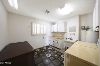 Come See This Augusta Model Home On Union Hills Golf Course In on Union Hills Country Club in Arizona - for sale on GolfHomes.com, golf home, golf lot