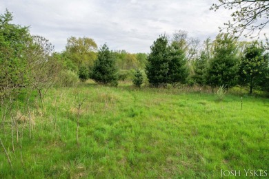 Beautiful acreage set up for horses! This lovely 3 bed, 1.5 bath on Grand Rapids Sparta Moose Golf Course in Michigan - for sale on GolfHomes.com, golf home, golf lot
