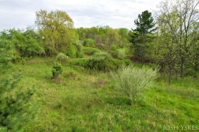 Beautiful acreage set up for horses! This lovely 3 bed, 1.5 bath on Grand Rapids Sparta Moose Golf Course in Michigan - for sale on GolfHomes.com, golf home, golf lot