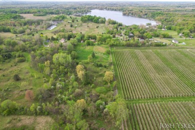 Beautiful acreage set up for horses! This lovely 3 bed, 1.5 bath on Grand Rapids Sparta Moose Golf Course in Michigan - for sale on GolfHomes.com, golf home, golf lot