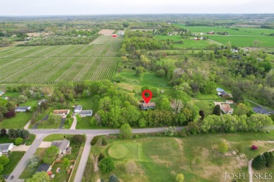 Beautiful acreage set up for horses! This lovely 3 bed, 1.5 bath on Grand Rapids Sparta Moose Golf Course in Michigan - for sale on GolfHomes.com, golf home, golf lot