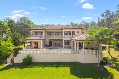 Discover the ultimate blend of Luxury and Nature in the guard on Bella Collina Golf Club in Florida - for sale on GolfHomes.com, golf home, golf lot