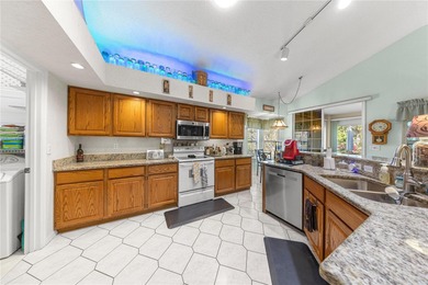 Welcome to this well-maintained home in the premier 55+ Oak Run on Royal Oaks Golf Club in Florida - for sale on GolfHomes.com, golf home, golf lot