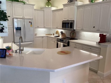 Mediterranean style Villa in beautiful Hampton Woods, located in on Sun n Lake Golf and Country Club in Florida - for sale on GolfHomes.com, golf home, golf lot