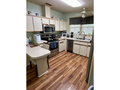 2 Bedroom | 2 Bath | 1,296 sq ft in highly sought after 55+ on Lake Henry Golf Club in Florida - for sale on GolfHomes.com, golf home, golf lot