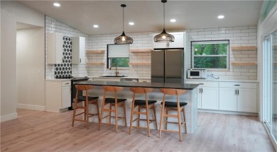 Completely remodeled and packed with charm, this 2 bed, 1.5 bath on Bella Vista Country Club - Berksdale in Arkansas - for sale on GolfHomes.com, golf home, golf lot