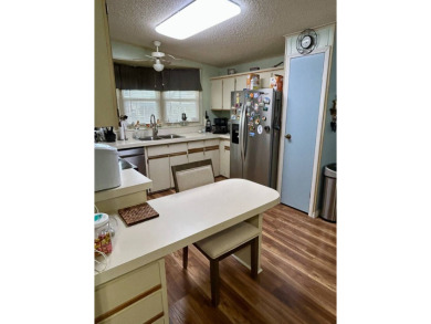2 Bedroom | 2 Bath | 1,296 sq ft in highly sought after 55+ on Lake Henry Golf Club in Florida - for sale on GolfHomes.com, golf home, golf lot