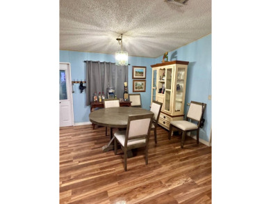 2 Bedroom | 2 Bath | 1,296 sq ft in highly sought after 55+ on Lake Henry Golf Club in Florida - for sale on GolfHomes.com, golf home, golf lot