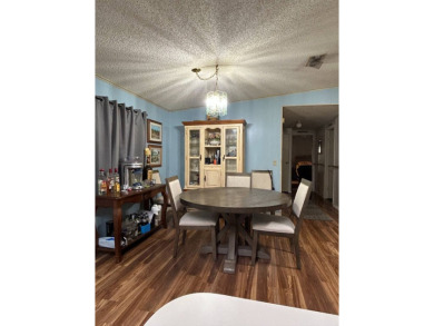 2 Bedroom | 2 Bath | 1,296 sq ft in highly sought after 55+ on Lake Henry Golf Club in Florida - for sale on GolfHomes.com, golf home, golf lot