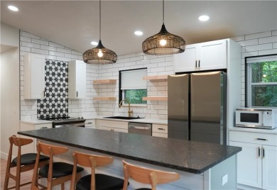 Completely remodeled and packed with charm, this 2 bed, 1.5 bath on Bella Vista Country Club - Berksdale in Arkansas - for sale on GolfHomes.com, golf home, golf lot