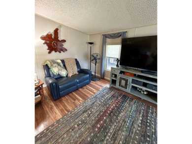 2 Bedroom | 2 Bath | 1,296 sq ft in highly sought after 55+ on Lake Henry Golf Club in Florida - for sale on GolfHomes.com, golf home, golf lot