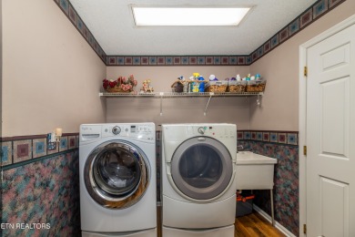 Beautiful home nestled among mature trees giving just enough on Emory Golf and Country Club in Tennessee - for sale on GolfHomes.com, golf home, golf lot