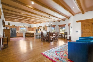 Adobe Dreams  Mountain Scenes!  Ready to fall in love with the on Taos Country Club in New Mexico - for sale on GolfHomes.com, golf home, golf lot