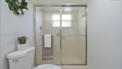 Buyer fell through--this beautifully updated corner unit is on Flamingo Lakes Country Club in Florida - for sale on GolfHomes.com, golf home, golf lot