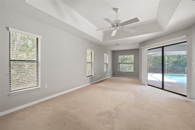 Built by Lindhorst, this warm and welcoming pool home is on Sugarmill Woods Golf and Country Club in Florida - for sale on GolfHomes.com, golf home, golf lot
