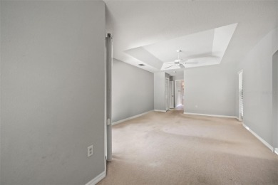 Built by Lindhorst, this warm and welcoming pool home is on Sugarmill Woods Golf and Country Club in Florida - for sale on GolfHomes.com, golf home, golf lot