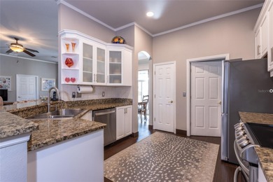 Under contract-accepting backup offers. This Beautiful on The Grand Club Cypress Course in Florida - for sale on GolfHomes.com, golf home, golf lot