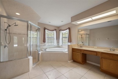 Built by Lindhorst, this warm and welcoming pool home is on Sugarmill Woods Golf and Country Club in Florida - for sale on GolfHomes.com, golf home, golf lot