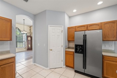 Built by Lindhorst, this warm and welcoming pool home is on Sugarmill Woods Golf and Country Club in Florida - for sale on GolfHomes.com, golf home, golf lot