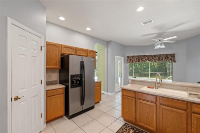 Built by Lindhorst, this warm and welcoming pool home is on Sugarmill Woods Golf and Country Club in Florida - for sale on GolfHomes.com, golf home, golf lot