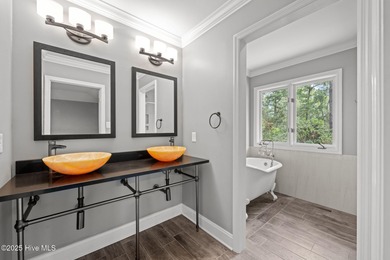 Welcome to 104 Lantern Lane: Discover this stunning home nestled on River Bend Golf and Country Club in North Carolina - for sale on GolfHomes.com, golf home, golf lot