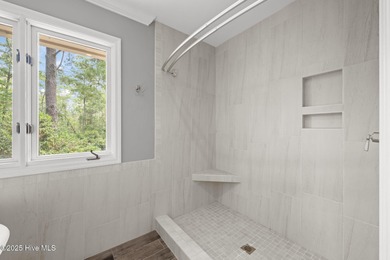 Welcome to 104 Lantern Lane: Discover this stunning home nestled on River Bend Golf and Country Club in North Carolina - for sale on GolfHomes.com, golf home, golf lot