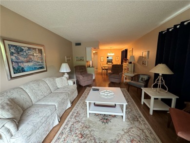 OWNER FINANCING! Active 55+ condo community with 18-27 hole golf on The American Golf Club in Florida - for sale on GolfHomes.com, golf home, golf lot