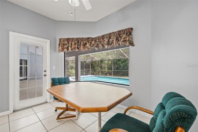 Built by Lindhorst, this warm and welcoming pool home is on Sugarmill Woods Golf and Country Club in Florida - for sale on GolfHomes.com, golf home, golf lot